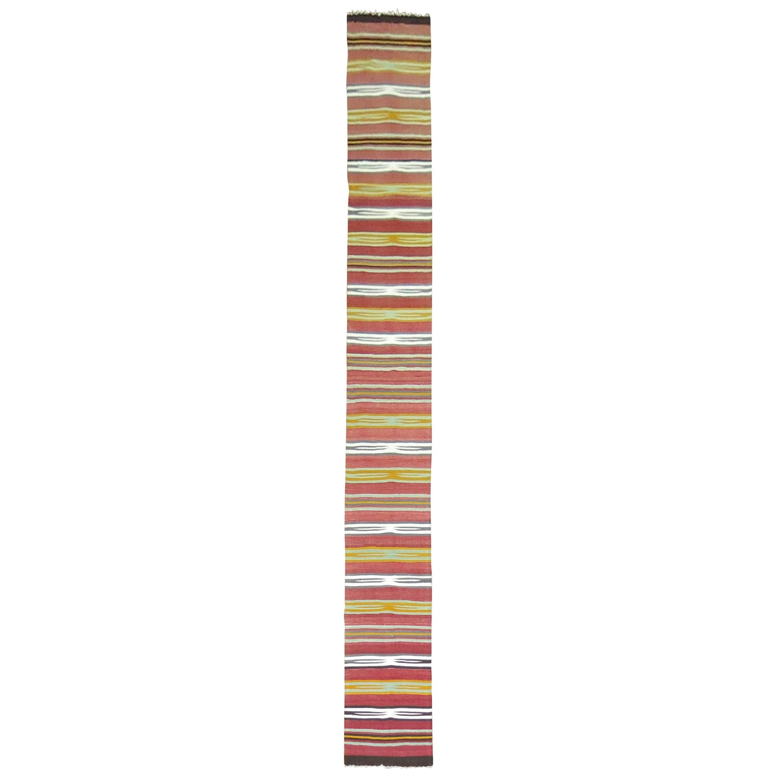 Zabihi Collection Rare Tribal Wool Kilim Runner 21 x 203 in: Zabihi Collection Rare Tribal Wool Kilim Runner 21 x 203 in Discover the beauty of this rare, narrow, and long striped Kilim runner from the Zabihi Collection. Hand-knotted in Turkey during the mid-20