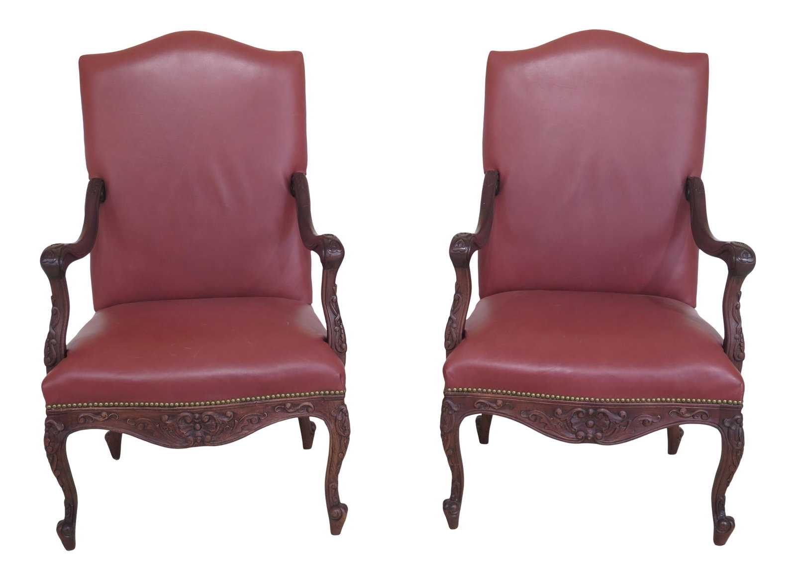 Vintage 1980s Old Hickory Tannery Carved Walnut Leather Arm Chairs Pair: Vintage 1980s Old Hickory Tannery Carved Walnut Leather Arm Chairs Pair This exquisite pair of arm chairs from Old Hickory Tannery features solid walnut construction and a stunning red leather upholst
