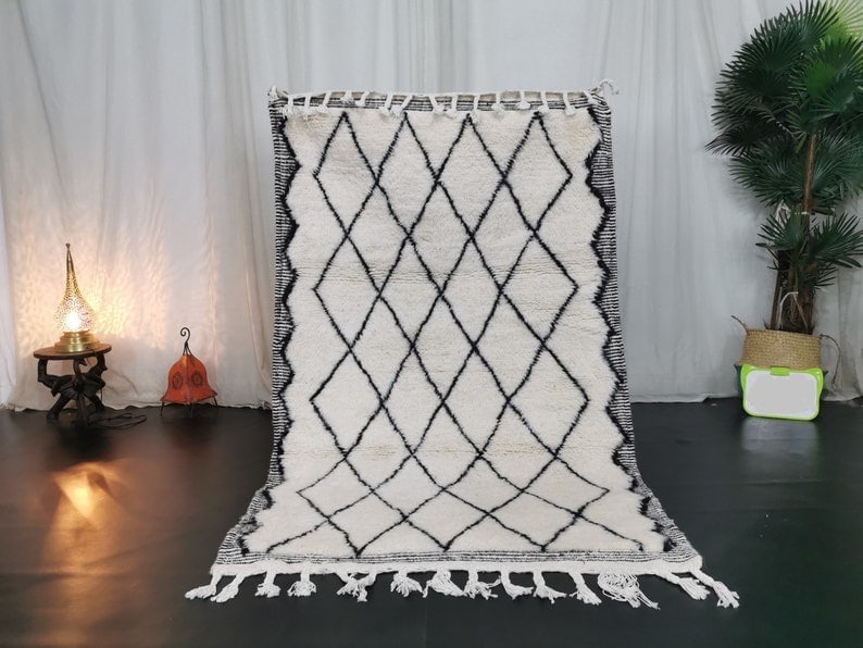 Handmade Moroccan Black and White Geometric Rug 3.28 x 5 Feet: Handmade Moroccan Black and White Geometric Rug 3.28 x 5 Feet Experience the beauty of traditional craftsmanship with this authentic handmade black and white rug. Handwoven by local Berber women in th