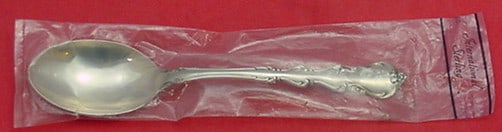 International Sterling Silver Angelique Serving Spoon 8 3/8 New: International Sterling Silver Angelique Serving Spoon 8 3/8 New This exquisite serving spoon, measuring 8 3/8 inches, features the elegant Angelique pattern from International Sterling. Crafted from g