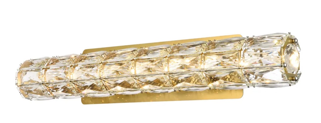 Valetta 24 Inch Gold Crystal LED Wall Sconce: Valetta 24 Inch Gold Crystal LED Wall Sconce Modern gold wall sconce with a crystal design and integrated LED lighting. It is hardwired for indoor installation and can be installed vertically or horiz