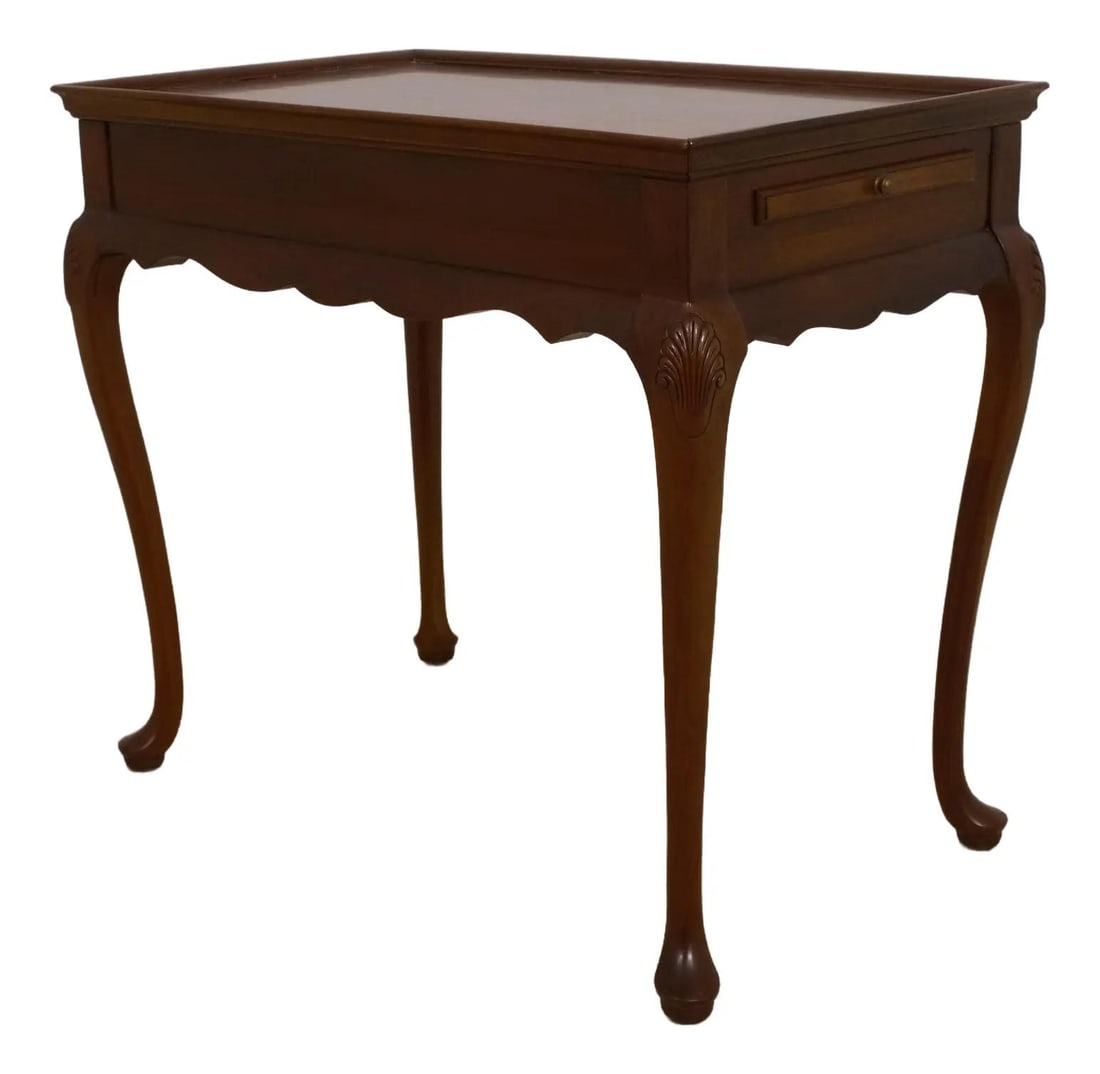 Hickory Chair Co Queen Anne Mahogany Tea Table with Candle Slides: Hickory Chair Co Queen Anne Mahogany Tea Table with Candle Slides This exquisite Queen Anne tea table is crafted from high-quality mahogany and showcases stunning shell-carved knees, embodying elegant