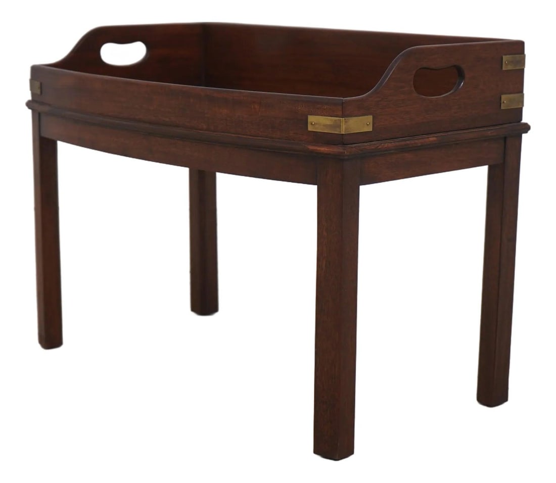 Chippendale Inspired Mahogany Coffee Table in English Campaign Design: Chippendale Inspired Mahogany Coffee Table in English Campaign Design This English Campaign style coffee table features high-quality construction in solid mahogany. Inspired by 18th-century Chippendal