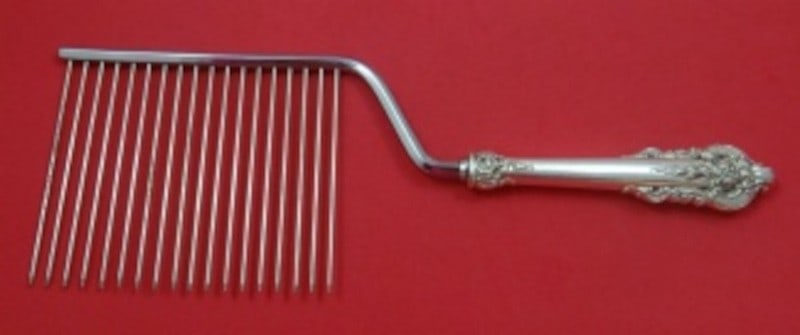 Grande Baroque Sterling Silver Cake Breaker by Wallace 11 1/4 Inch: Grande Baroque Sterling Silver Cake Breaker by Wallace 11 1/4 Inch This Grande Baroque cake breaker by Wallace features a sterling silver hollow handle and a stainless steel implement. Designed in the