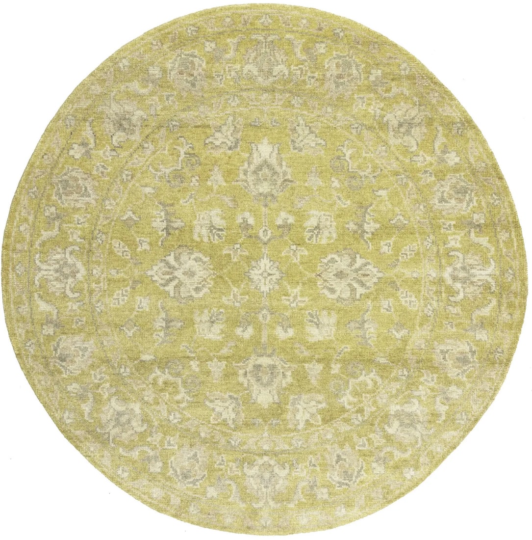 Hand-Knotted Round Wool Rug 6x6 Floral Transitional Pattern: Hand-Knotted Round Wool Rug 6x6 Floral Transitional Pattern This round handmade Oriental rug features a muted floral design in golden yellow, cream, brown, and other soft tones. Hand-knotted from wool
