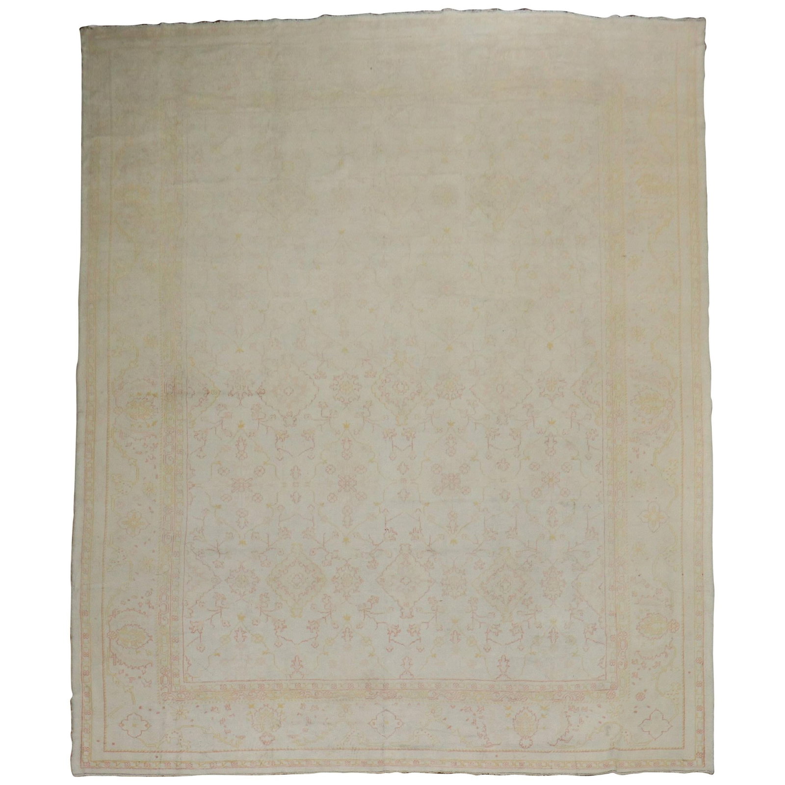 Early 20th Century Pale Cream Turkish Oushak Rug 11' x 15'3' Wool Hand-Woven: Early 20th Century Pale Cream Turkish Oushak Rug 11' x 15'3' Wool Hand-Woven This exquisite early 20th century antique Turkish Oushak rug showcases a delicate pale cream ivory ground adorned with warm
