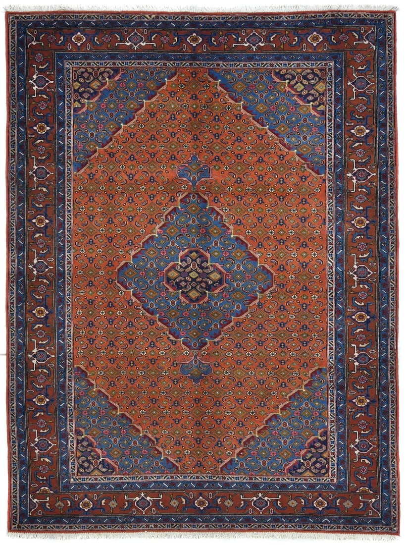 Hand knotted wool vintage oriental area rug 6'7 x 9'4: Hand knotted wool vintage oriental area rug 6'7 x 9'4 This vintage hand-knotted wool Oriental rug features a classic geometric pattern in a vibrant palette of orange, blue, cream, gold, pink, and red.