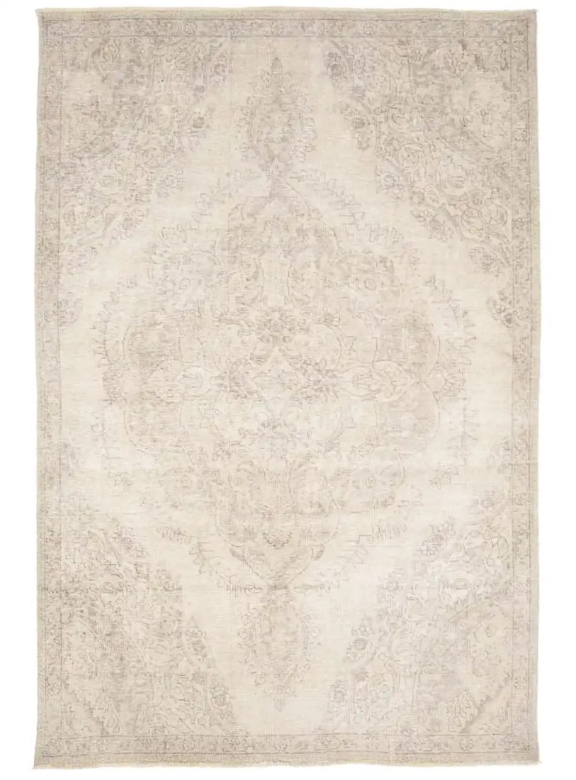 Handmade Vintage Floral Wool Area Rug 5'2 x 8' Muted Tones: Handmade Vintage Floral Wool Area Rug 5'2 x 8' Muted Tones This antique hand-knotted Oriental rug features a muted floral pattern in cream, beige, brown, and other subtle tones. Made from wool using t