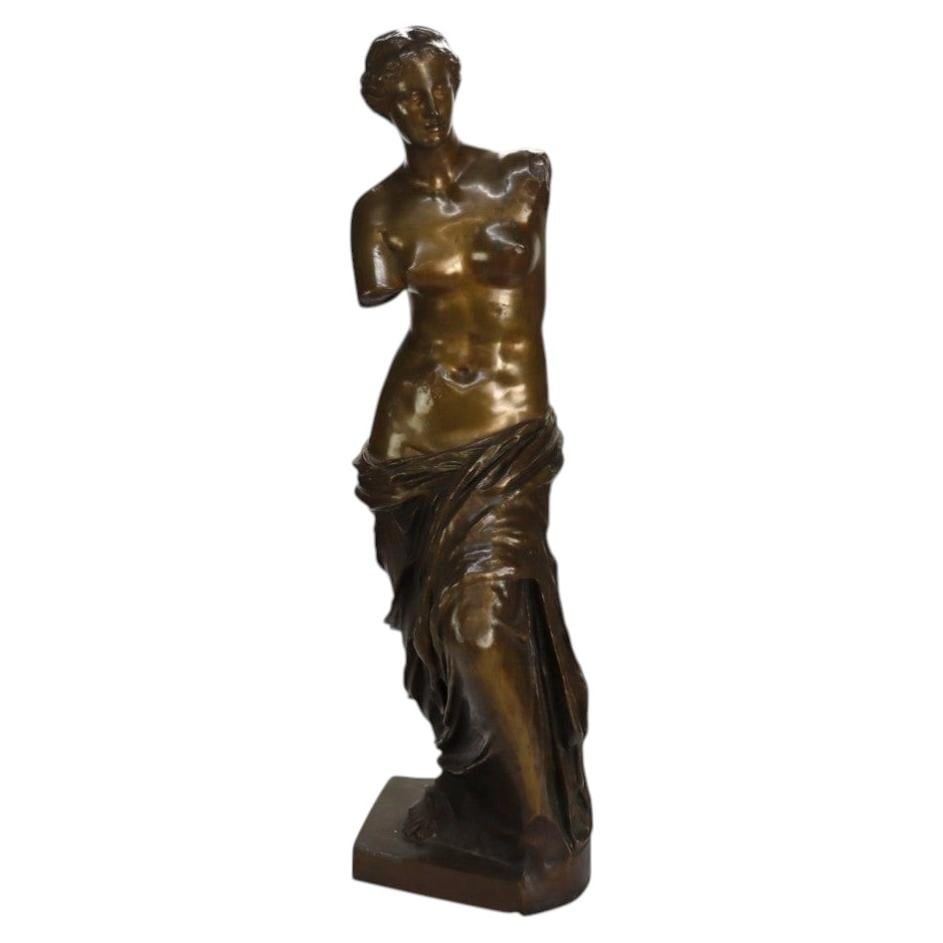 Bronze Venus de Milo reduction sculpture c1900: Bronze Venus de Milo reduction sculpture c1900 This impressive early 20th-century bronze sculpture is a large-scale 'Reduction Sauvage' replica of the renowned 'Venus de Milo.' Crafted circa 1900, it 