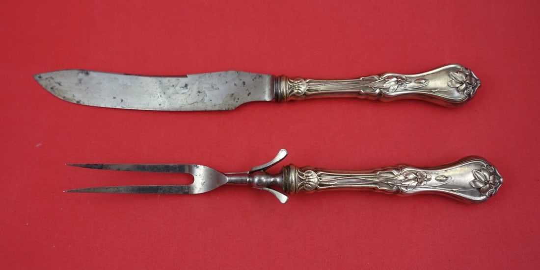 Set of 2 Sterling Silver Carving Utensils Violet Pattern by Whiting: Set of 2 Sterling Silver Carving Utensils Violet Pattern by Whiting This two-piece roast carving set by Whiting is crafted in sterling silver and features the elegant Violet pattern. The set includes 