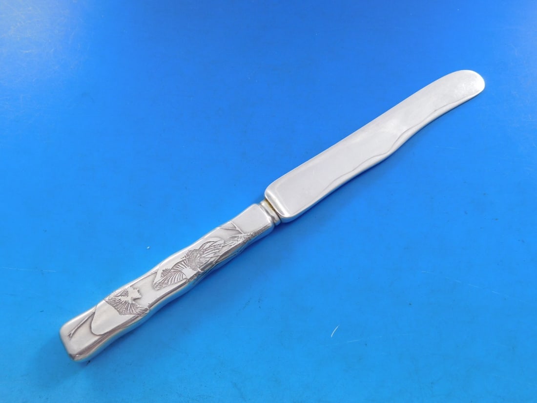 Tiffany & Co. Lap Over Edge Sterling Silver Dessert Knife with Mushrooms: Tiffany & Co. Lap Over Edge Sterling Silver Dessert Knife with Mushrooms This exquisite dessert knife features the Lap Over Edge pattern, crafted by Tiffany & Co. Made from high-quality sterling silve
