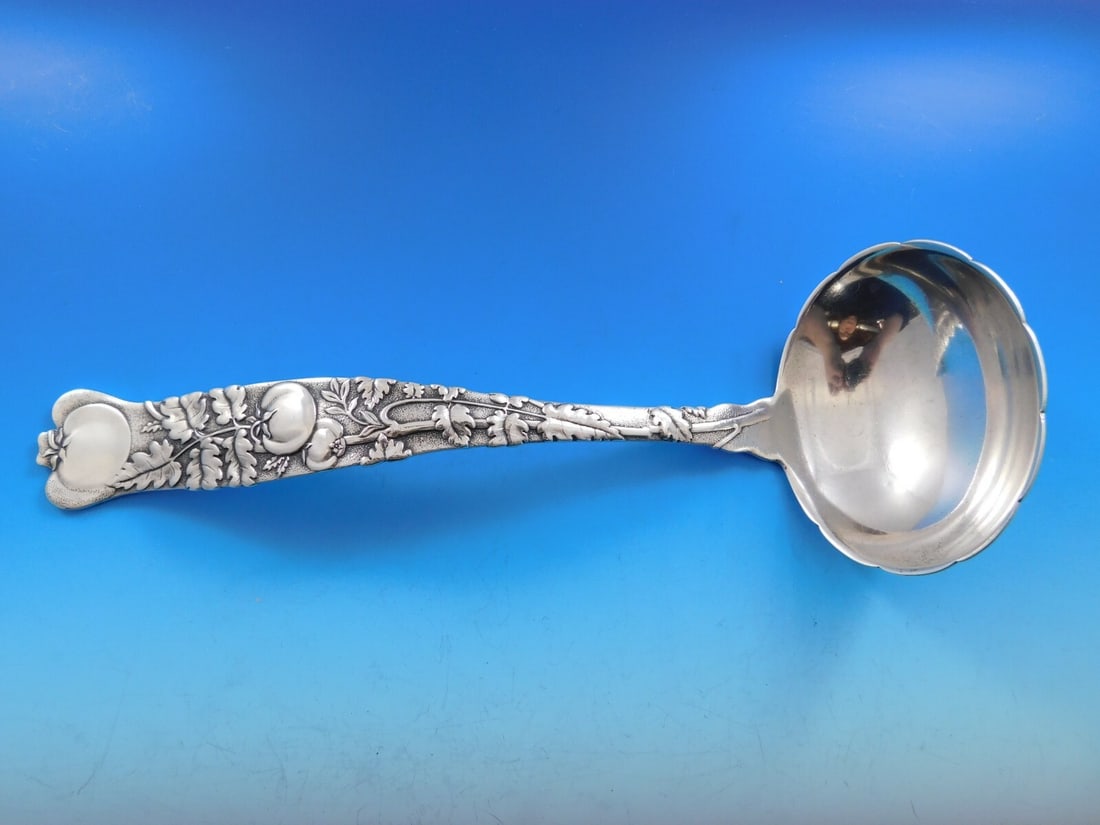 Tiffany & Co Vine Sterling Silver Soup Ladle 12 Ruffled Edge Tomato Motif: Tiffany & Co Vine Sterling Silver Soup Ladle 12 Ruffled Edge Tomato Motif This exquisite soup ladle from Tiffany & Co. showcases the iconic Vine pattern, which features a charming tomato motif on the 