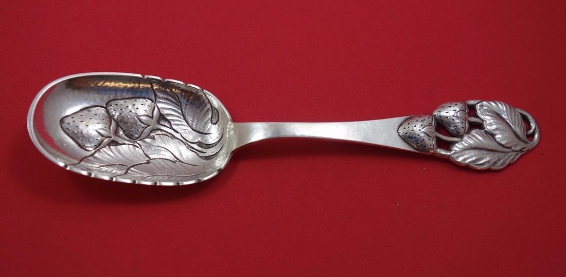 Carl Nielsen Sterling Silver Berry Spoon 10 Embossed Strawberries Design: Carl Nielsen Sterling Silver Berry Spoon 10 Embossed Strawberries Design This exquisite Danish Sterling Silver Berry Spoon by Carl Nielsen features beautifully embossed strawberries in a bowl design. 