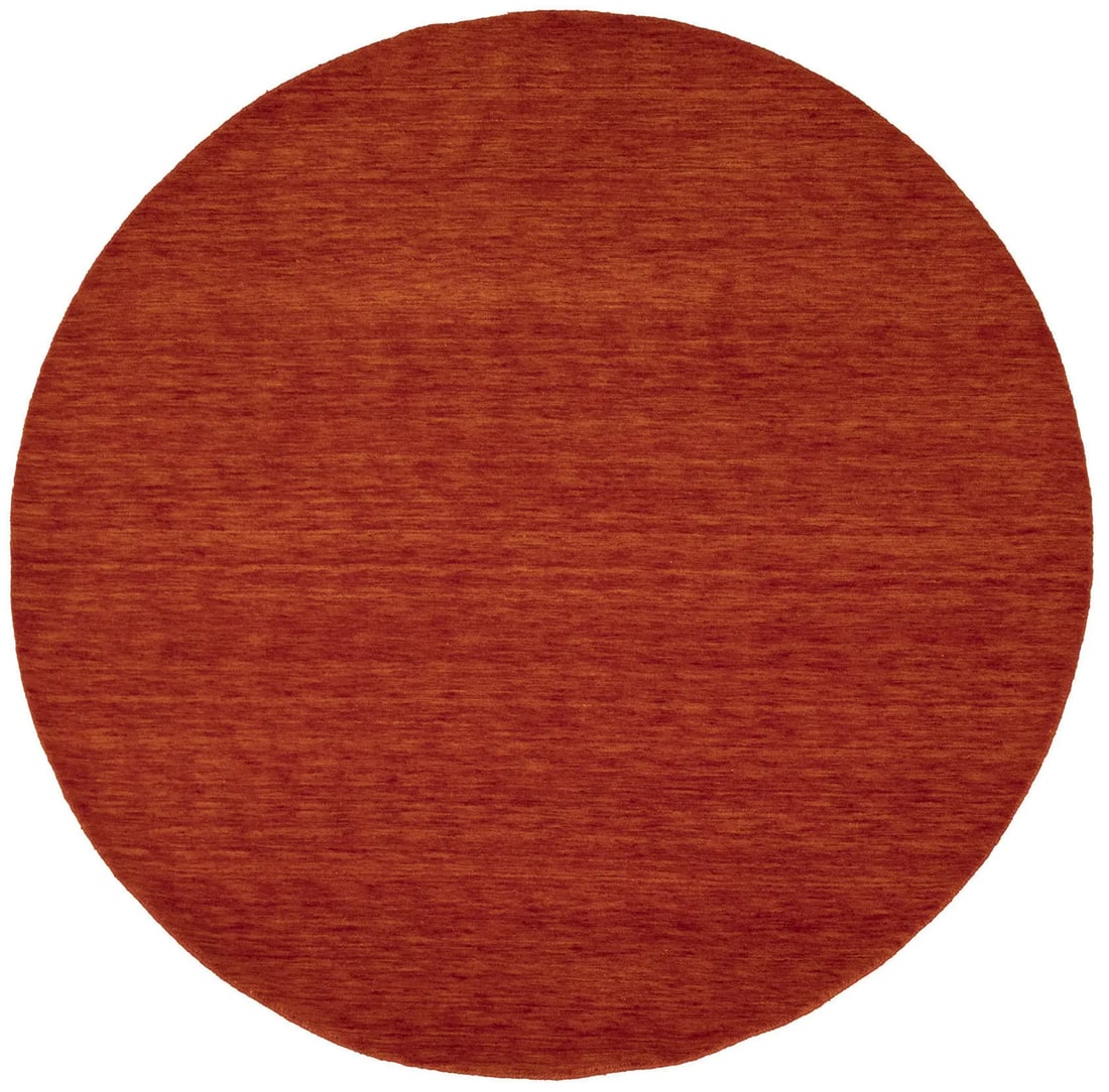 Orange Red Modern Round Wool Gabbeh Rug Hand Loomed 5'11 x 5'11: Orange Red Modern Round Wool Gabbeh Rug Hand Loomed 5'11 x 5'11 This round area rug features a solid orange-red color and is hand-loomed from wool. With a modern design, it is suitable for various spa
