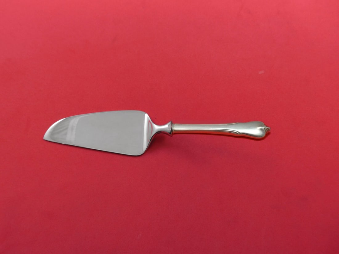 Wallace Grand Colonial Sterling Silver Cheese Server 7 1/8 Custom: Wallace Grand Colonial Sterling Silver Cheese Server 7 1/8 Custom This exquisite cheese server features a sterling silver hollow handle complemented by a stainless steel blade, designed in the elegant