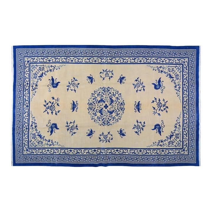 9'10" x 15'3" Hand Knotted Wool Chinese Art Deco Area Rug: 9'10" x 15'3" Hand Knotted Wool Chinese Art Deco Area Rug This vintage Chinese Art Deco rug is hand-knotted from wool, showcasing traditional craftsmanship blended with modern design influences. The r