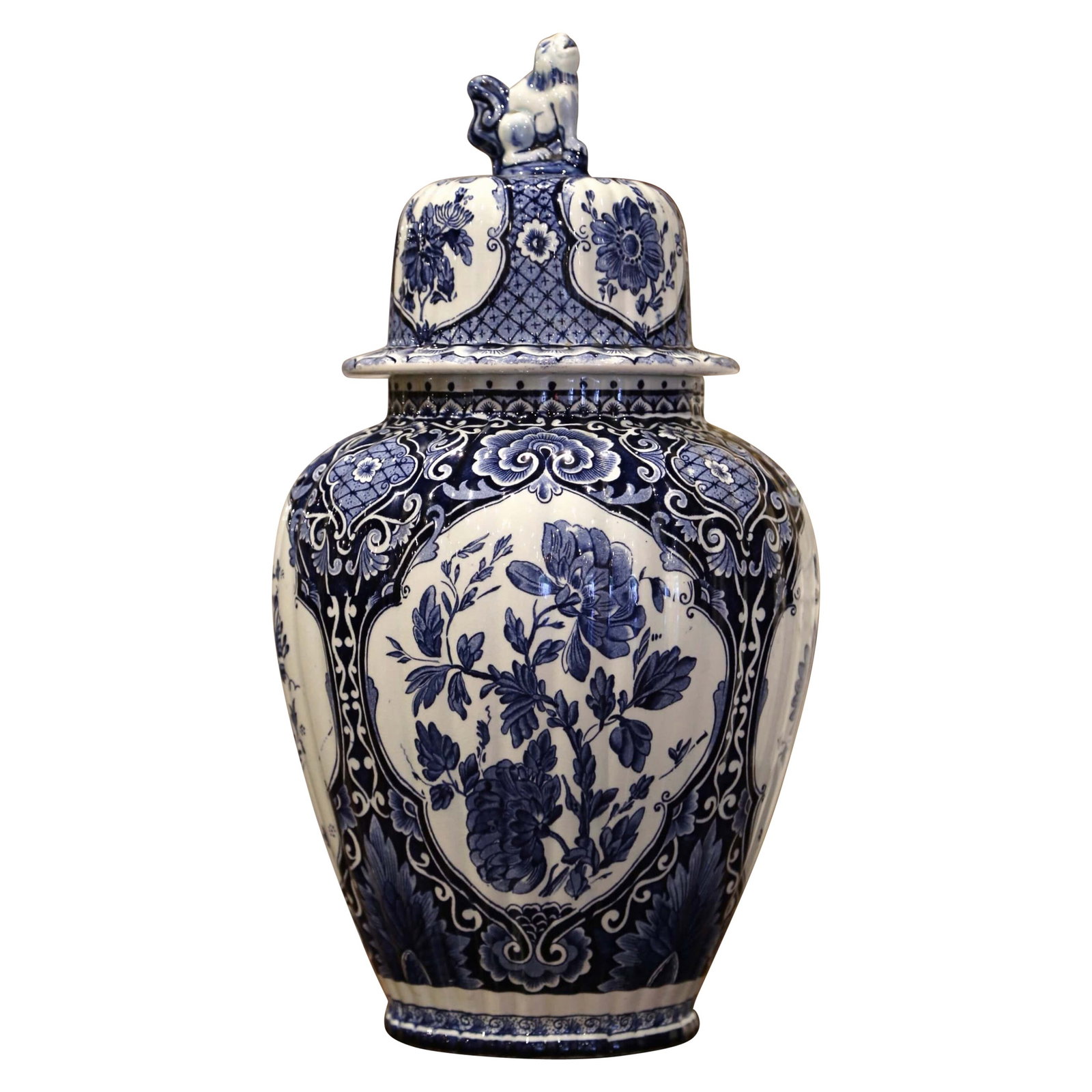 Delft Faience Ginger Jar with Dog Finial Lid: Delft Faience Ginger Jar with Dog Finial Lid This mid-century Dutch Delft ginger jar, crafted circa 1950 in the Netherlands, is a fine example of traditional faience ceramic artistry. The baluster-sha