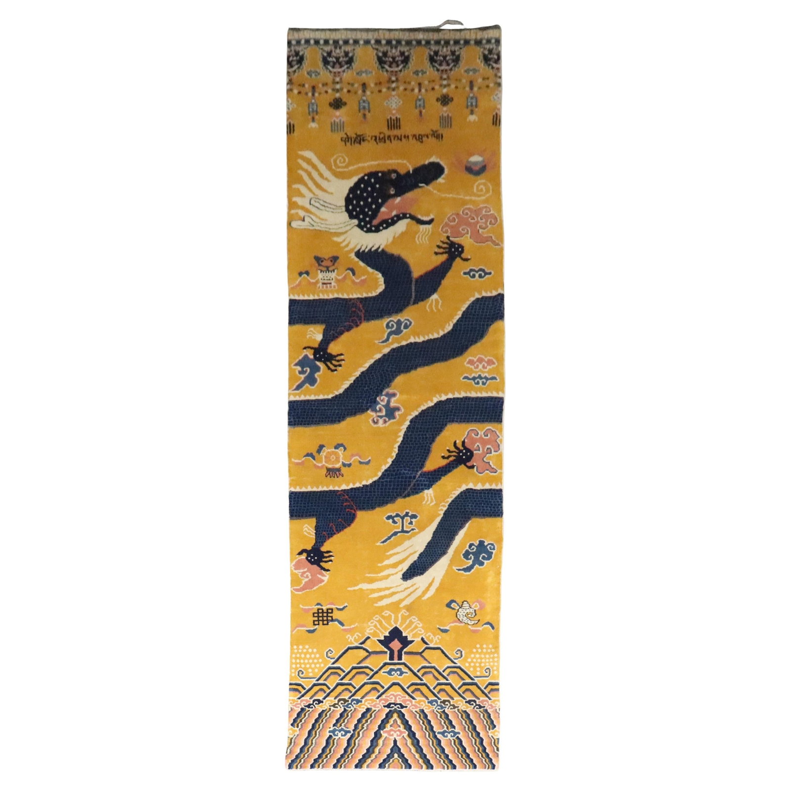 Yellow Wool Tibetan Dragon Pillar Runner Rug 53 x 204 Inches: Yellow Wool Tibetan Dragon Pillar Runner Rug 53 x 204 Inches This vintage Tibetan Dragon Pillar runner features a vibrant yellow background and is hand-knotted from wool. With its rare and wide dimens
