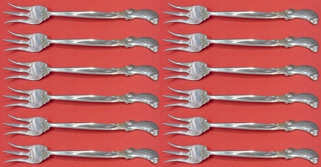 Wallace Waltz of Spring Sterling Silver 12 Cocktail Fork Set 5 5/8": Wallace Waltz of Spring Sterling Silver 12 Cocktail Fork Set 5 5/8" Enhance your dining experience with this exquisite 12-piece Sterling Silver Cocktail Fork Set in the elegant Waltz of Spring pattern