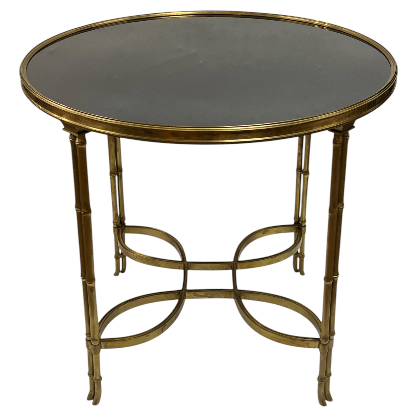 Mid Century Bronze Marble Center Table Faux Bamboo Legs: Mid Century Bronze Marble Center Table Faux Bamboo Legs This vintage mid-century modern center table features a circular black marble top supported by a cast bronze frame. The table is distinguished b