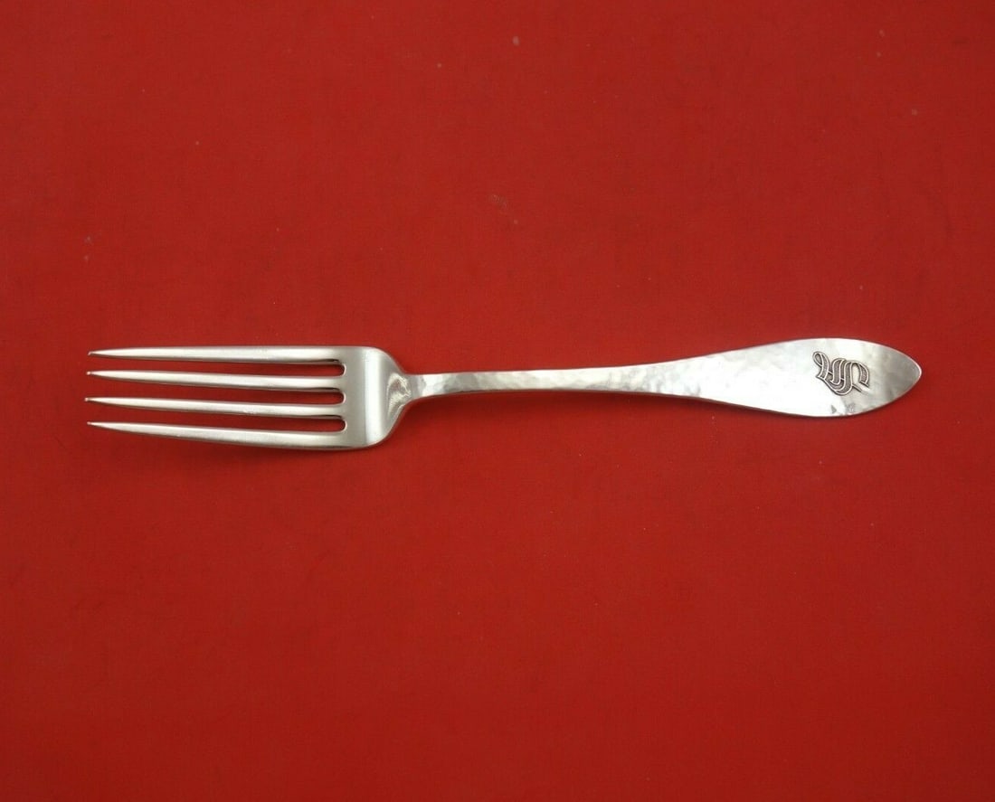 Shreve Antique Hammered Sterling Silver Dinner Fork with Monogram S 8": Shreve Antique Hammered Sterling Silver Dinner Fork with Monogram S 8" This exquisite dinner fork, designed by Shreve, showcases a classic Antique Hammered pattern. Crafted from high-quality sterling