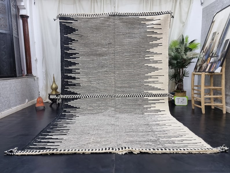 Authentic Handwoven Berber Rug 100% Sheep Wool Morocco 10 x 6.56 Feet: Authentic Handwoven Berber Rug 100% Sheep Wool Morocco 10 x 6.56 Feet This Authentic Stunning Rug is a beautiful handwoven piece crafted in the Atlas Mountains by local Berber women weavers. Utilizing