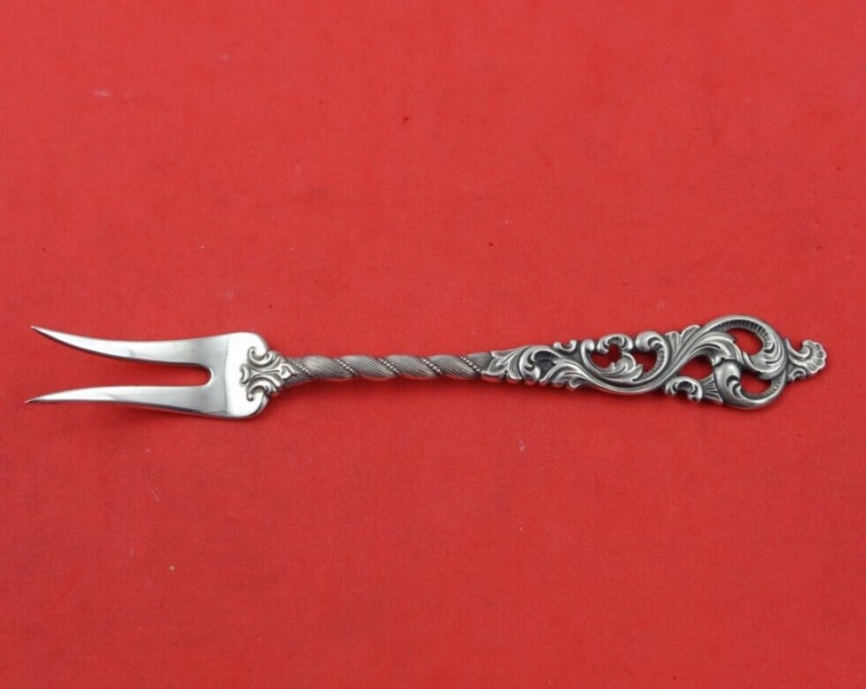 Brodrene Lohne Dobbel Rokokko Sterling Silver Lemon Fork 5 1/4 inches: Brodrene Lohne Dobbel Rokokko Sterling Silver Lemon Fork 5 1/4 inches This exquisite lemon fork, crafted in Norwegian sterling silver, showcases the elegant Dobbel Rokokko pattern by Brodrene Lohne. M
