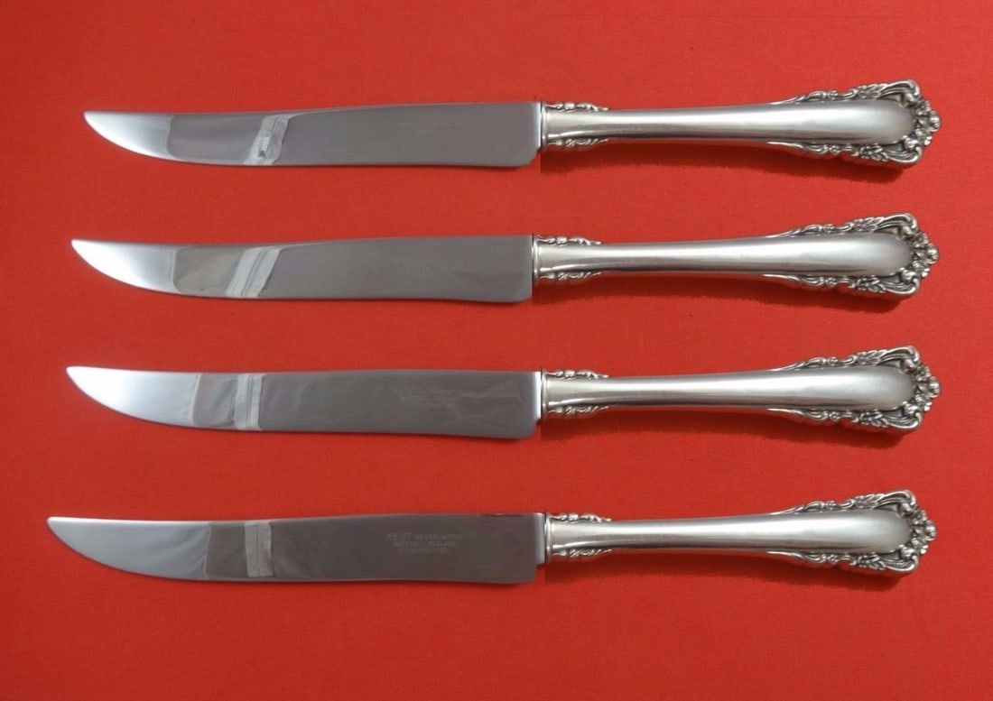 Lunt Carillon Sterling Silver Steak Knife Set 4pc Texas Size: Lunt Carillon Sterling Silver Steak Knife Set 4pc Texas Size Elevate your dining experience with this 4-piece steak knife set from the Carillon pattern by Lunt. Crafted from sterling silver with a hol