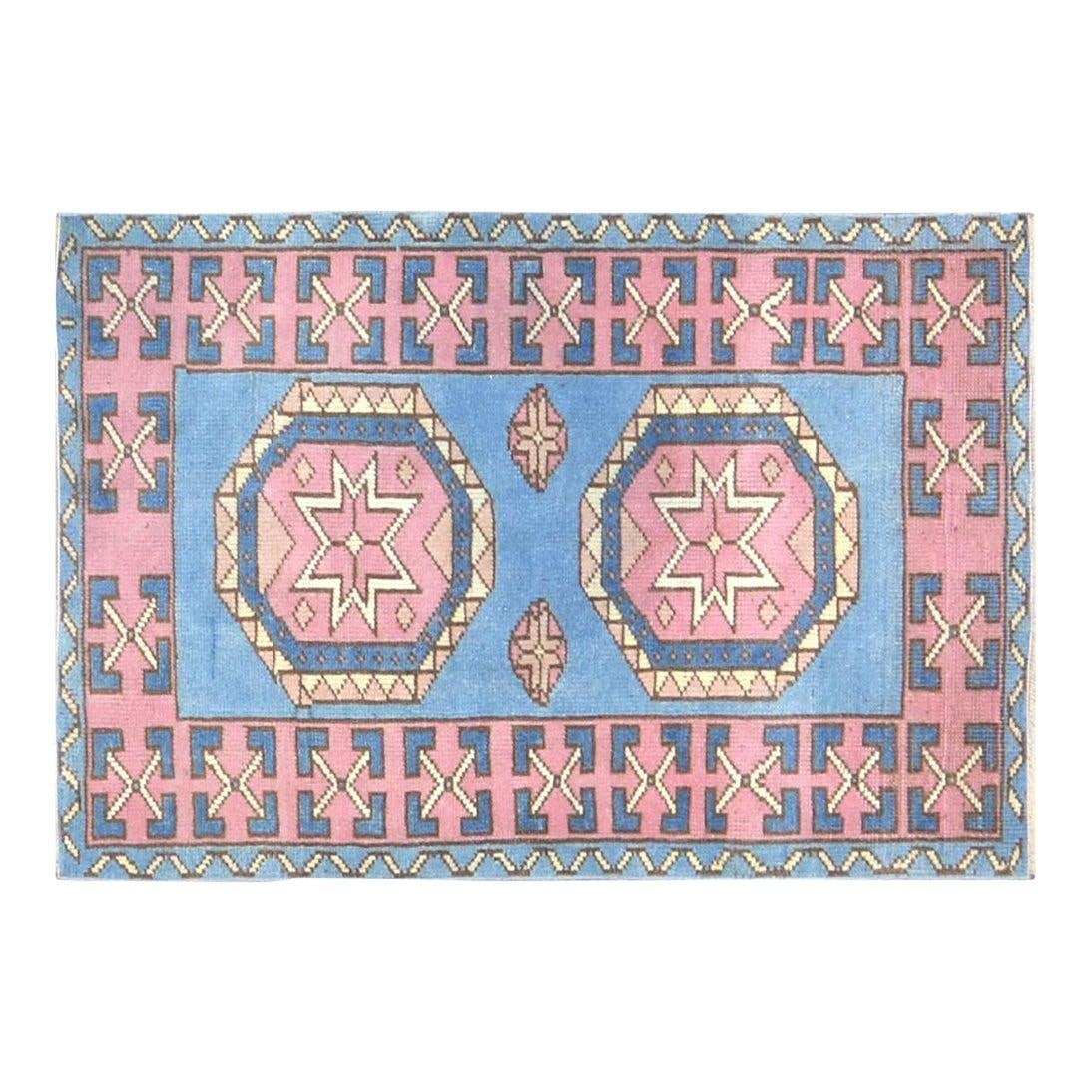 Hand-Knotted Wool Anatolian Rug Raspberry Red 2'6" x 3'8": Hand-Knotted Wool Anatolian Rug Raspberry Red 2'6" x 3'8" This vintage Turkish Anatolian rug is hand-knotted from wool using traditional techniques, blending timeless craftsmanship with a modern desig