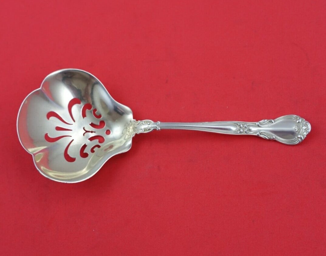 Gorham Chantilly Sterling Silver Slotted Confection Spoon 5 1/4": Gorham Chantilly Sterling Silver Slotted Confection Spoon 5 1/4" This exquisite Chantilly by Gorham confection spoon is crafted from high-quality sterling silver and measures 5 1/4 inches in length. D