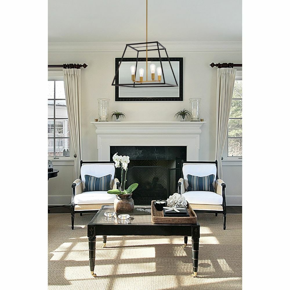 Living District Declan 4 Light Black Brass Pendant: Living District Declan 4 Light Black Brass Pendant This modern farmhouse-style chandelier features a striking black and brass finish and a trapezoid-shaped open shade, making it an elegant addition to