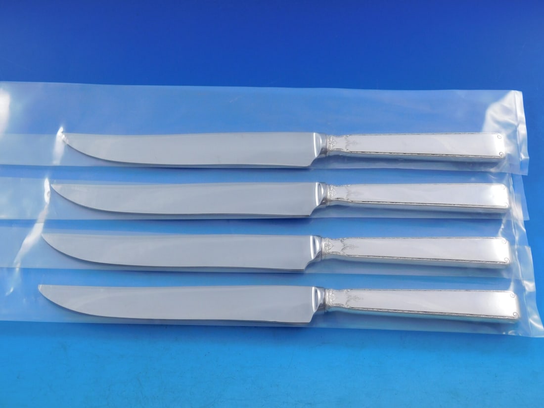 Towle Old Lace Sterling Silver 4pc Texas Sized Steak Knife Set 10 1/4": Towle Old Lace Sterling Silver 4pc Texas Sized Steak Knife Set 10 1/4" Discover the exquisite Old Lace by Towle Sterling Silver Steak Knife Set, featuring four impressive Texas-sized knives, each meas