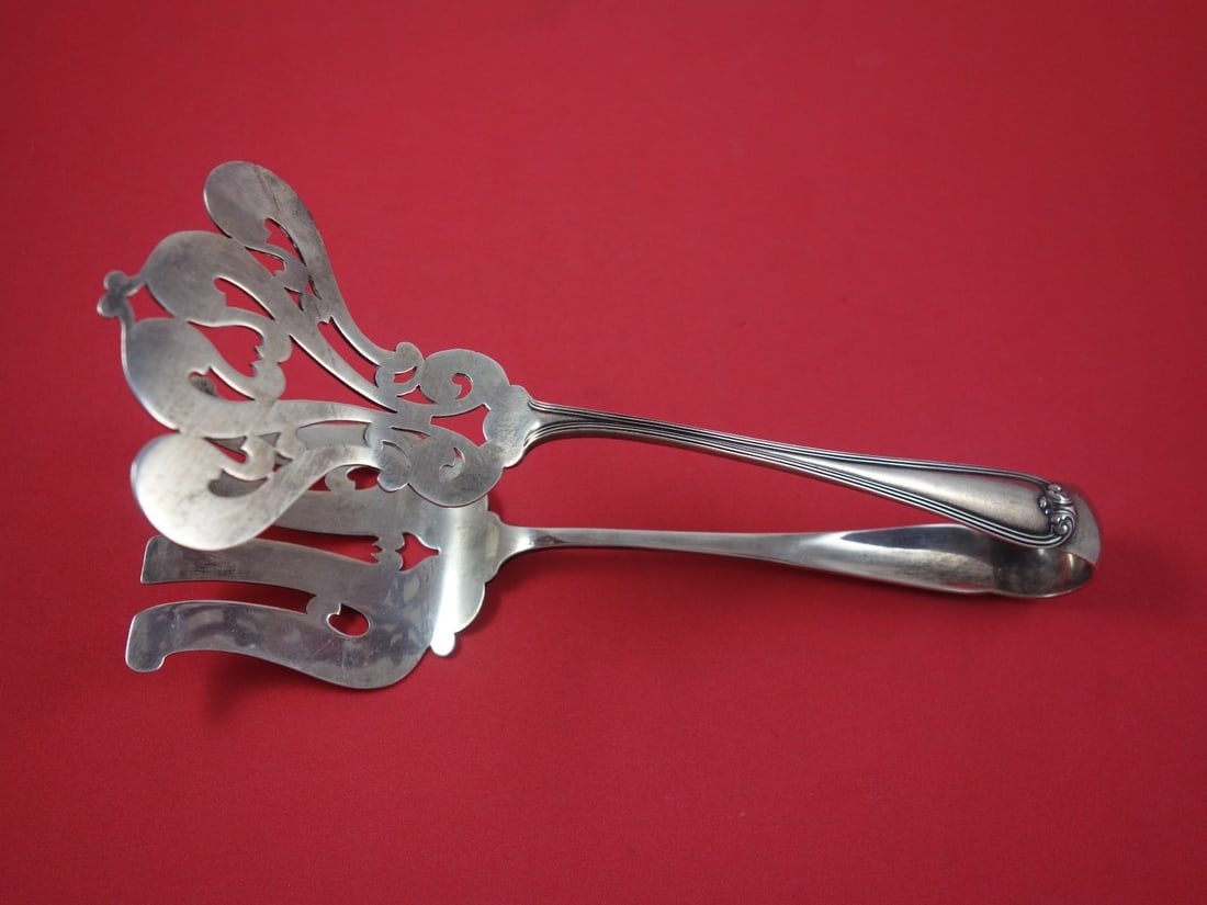 Durgin Sterling Silver Asparagus Serving Tong Monogrammed 1886-1911 9 Inch: Durgin Sterling Silver Asparagus Serving Tong Monogrammed 1886-1911 9 Inch This exquisite asparagus serving tong, crafted by Durgin, is a stunning example of sterling silver artistry. Dating from 1886
