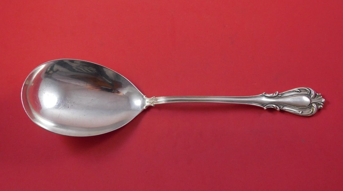 Camusso Boston Sterling Silver 11 Inch Vegetable Serving Spoon: Camusso Boston Sterling Silver 11 Inch Vegetable Serving Spoon A Boston pattern vegetable serving spoon by Camusso, made of sterling silver and measuring 11 inches. It is not monogrammed and is in exc
