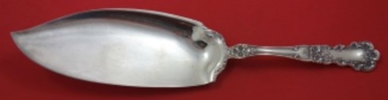 Sterling Silver Fish Server Buttercup Pattern 11.5 Inch by Gorham: Sterling Silver Fish Server Buttercup Pattern 11.5 Inch by Gorham This is a Gorham Buttercup pattern fish server crafted from sterling silver. The piece features intricately carved floral motifs along