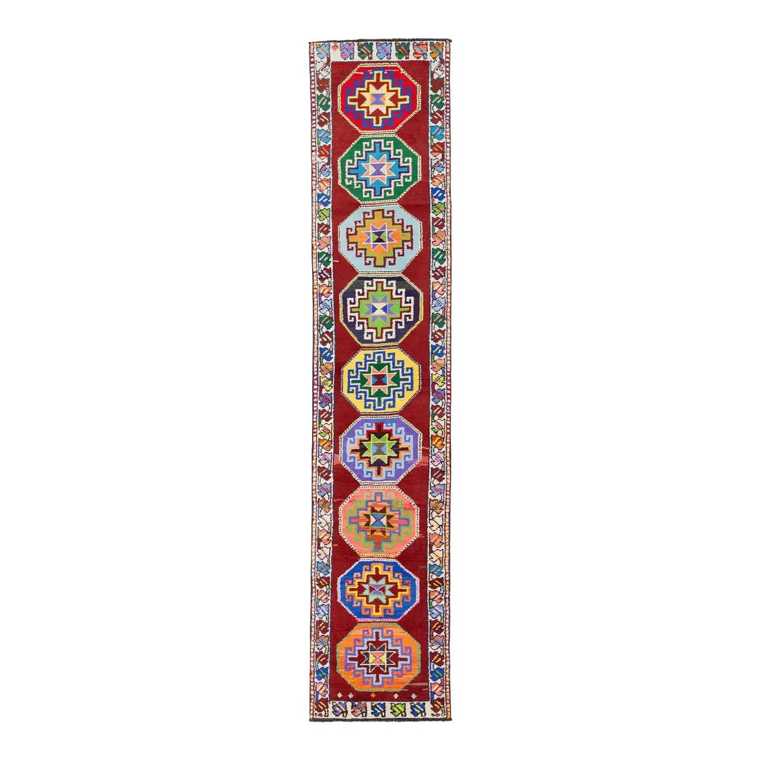 Turkish Wool Runner Rug with Multicolor Geometric Octagon Motifs 2'5" x 11'10": Turkish Wool Runner Rug with Multicolor Geometric Octagon Motifs 2'5" x 11'10" This vintage Turkish hand-knotted wool runner showcases vibrant octagonal medallions set against a rich red background. H