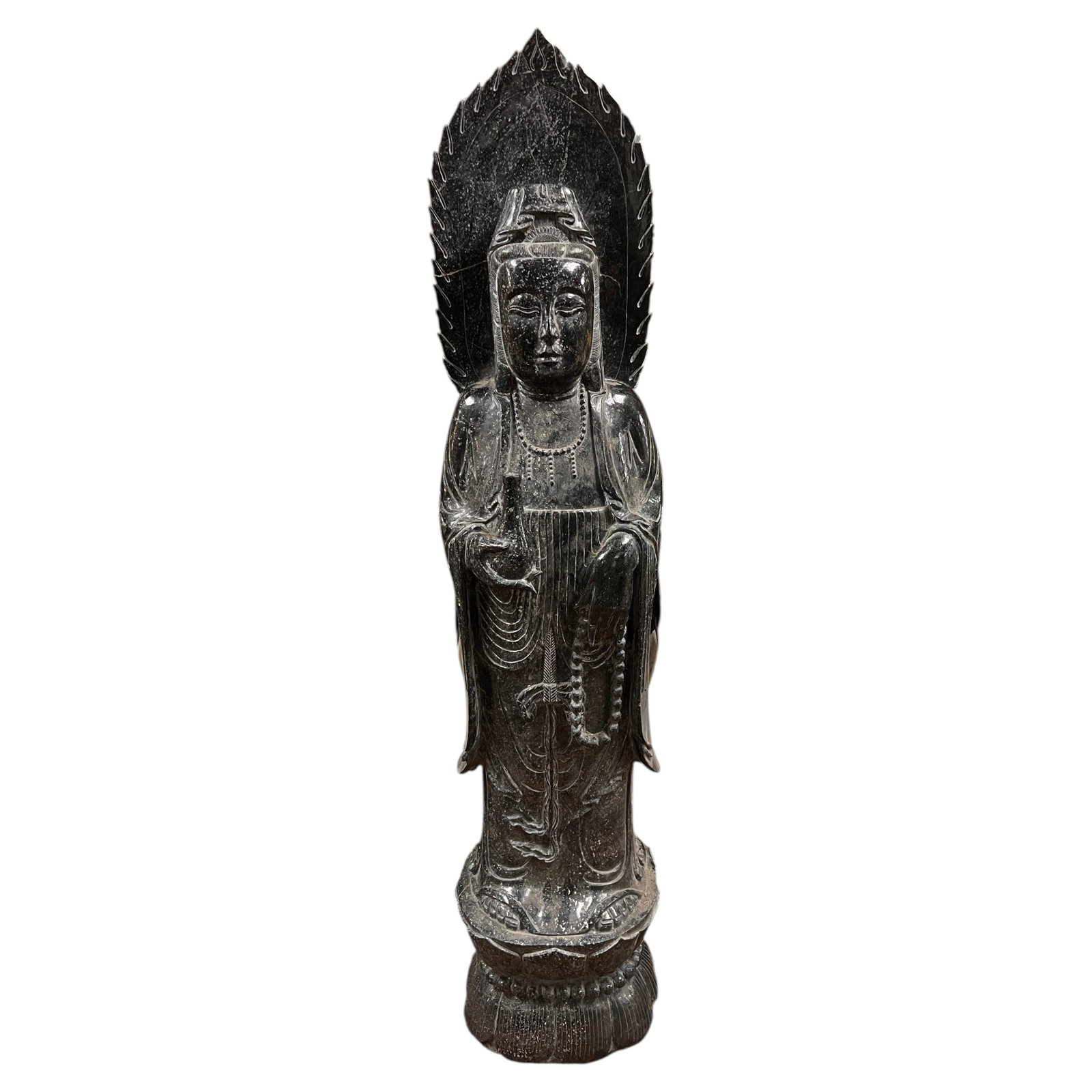 61 in Carved Stone Guanyin Bodhisattva Statue: 61 in Carved Stone Guanyin Bodhisattva Statue This is a large, intricately carved statue depicting the Bodhisattva Guanyin, also known as Avalokiteshvara, the embodiment of compassion. Crafted from ch