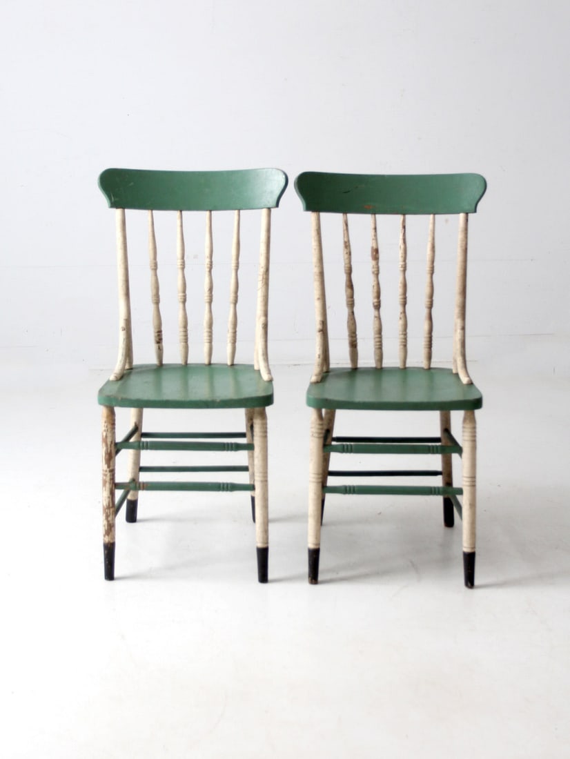 Rustic Antique Farmhouse Chairs Pair with Green Seats: Rustic Antique Farmhouse Chairs Pair with Green Seats This charming pair of antique farmhouse chairs adds a touch of rustic elegance to any room. Each chair features a green seat and crest rail comple