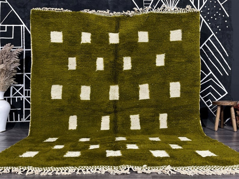 Authentic Green Engraved Rug Handwoven in Morocco: Authentic Green Engraved Rug Handwoven in Morocco Discover the beauty of this Authentic Green Engraved Rug, meticulously handwoven by skilled Berber women weavers in the Atlas Mountains of Morocco. Cr