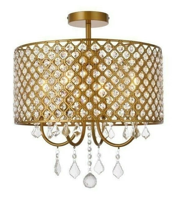 Living District Elise 4 Light Brass Crystal Semi Flush Chandelier 17 in: Living District Elise 4 Light Brass Crystal Semi Flush Chandelier 17 in Modern semi flush mount crystal chandelier light fixture in brass color with clear Royal Cut crystals. It features a round open 
