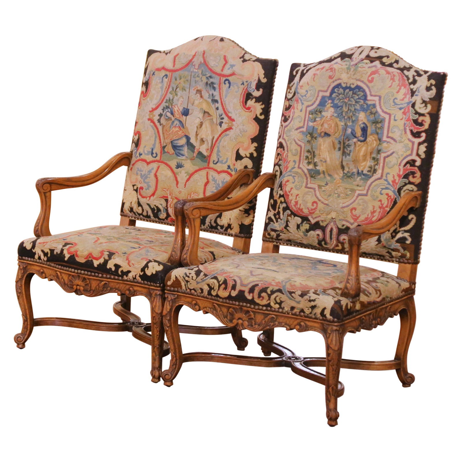 Set of Two Antique Louis XV French Walnut Armchairs with Original Needlepoint Seats: Set of Two Antique Louis XV French Walnut Armchairs with Original Needlepoint Seats This pair of late 19th-century French Louis XV armchairs is expertly crafted from walnut and showcases refined hand-