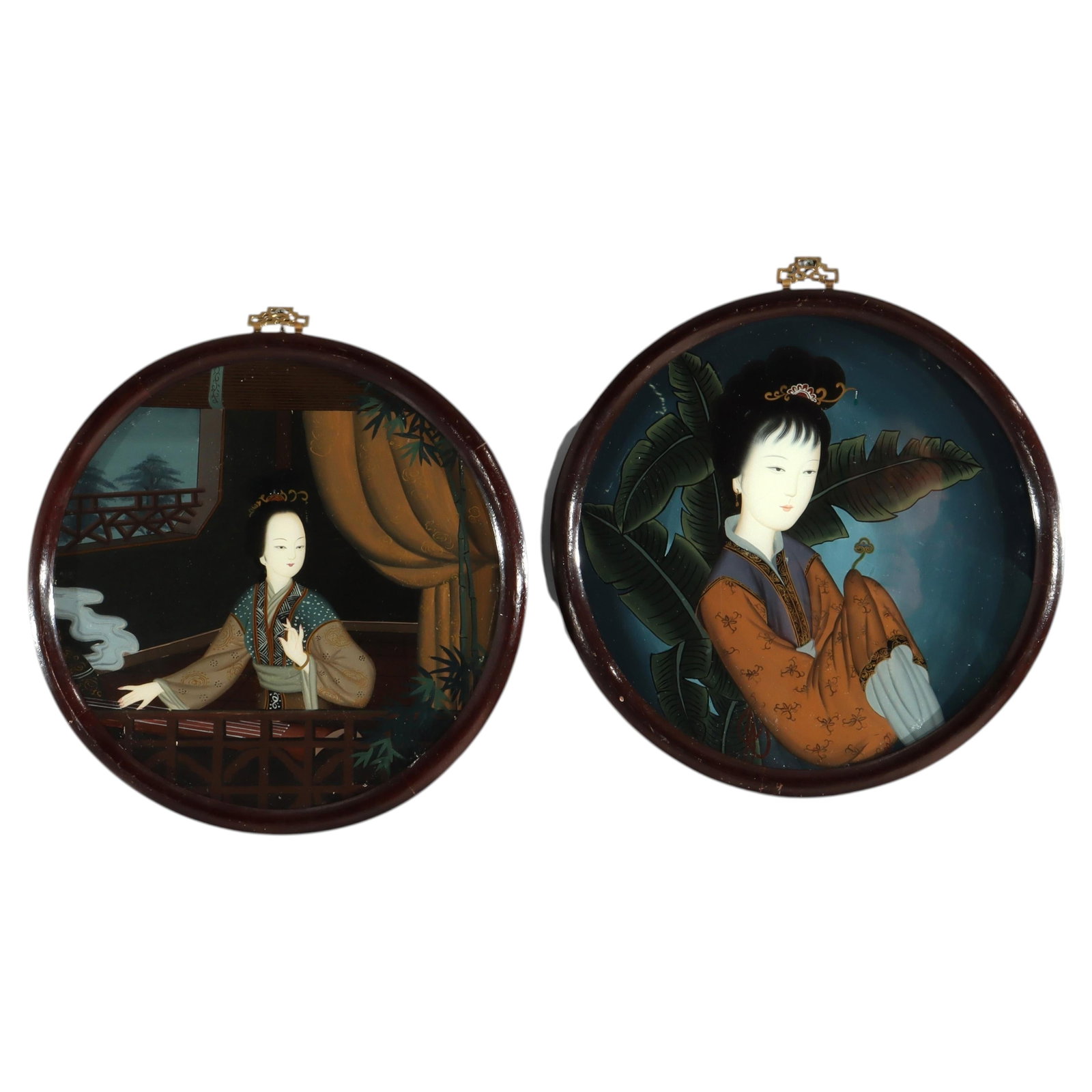 Set of Two Chinese Glass Portrait Panels Reverse Painted Circa 1920: Set of Two Chinese Glass Portrait Panels Reverse Painted Circa 1920 This pair of antique Chinese wall panels from circa 1920 features reverse-painted portraits of women on glass, set within ebonized f