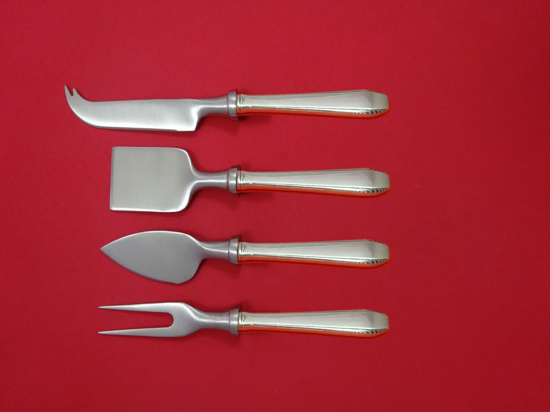 Towle Cascade Sterling Silver 4 Piece Cheese Serving Set: Towle Cascade Sterling Silver 4 Piece Cheese Serving Set Enhance your cheese serving experience with the Cascade by Towle Sterling Silver Cheese Serving Set. This exquisite 4-piece hostess set feature