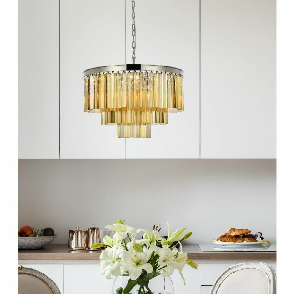 Sydney 26 in Crystal Chandelier Polished Nickel 9 Light: Sydney 26 in Crystal Chandelier Polished Nickel 9 Light Modern crystal chandelier with a polished nickel frame and golden teak royal cut crystals. It is a 9-light indoor ceiling fixture with adjustabl