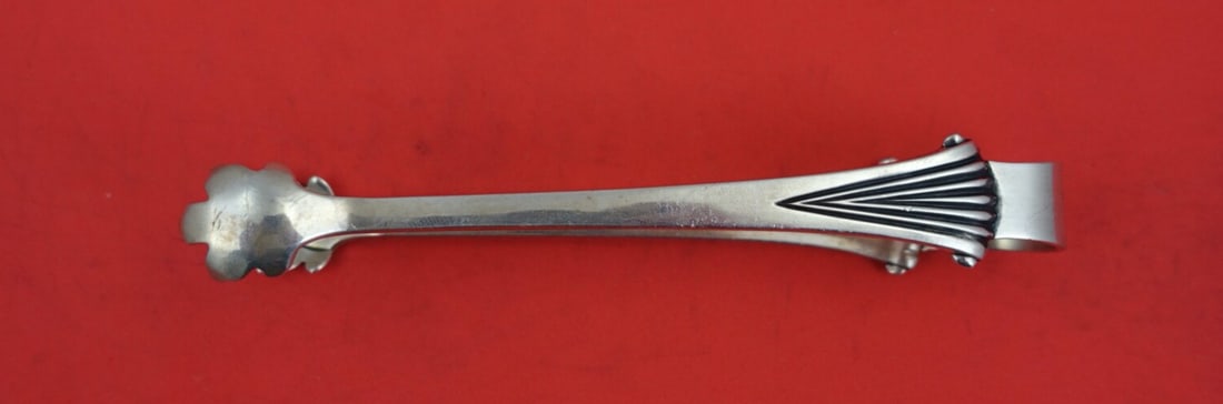 Tuttle Onslow Sterling Silver Sugar Tong DEI 5 Inch Serving Tool: Tuttle Onslow Sterling Silver Sugar Tong DEI 5 Inch Serving Tool This exquisite sugar tong, crafted by Tuttle in the elegant Onslow pattern, is a perfect addition to your serving collection. Made from
