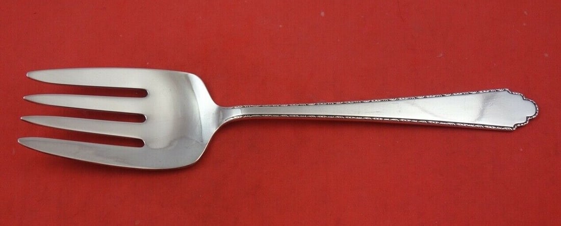 Lunt Sterling Silver William and Mary Salad Serving Fork 7 5/8 inches: Lunt Sterling Silver William and Mary Salad Serving Fork 7 5/8 inches Elevate your dining experience with this exquisite William and Mary salad serving fork by Lunt. Crafted from high-quality sterling