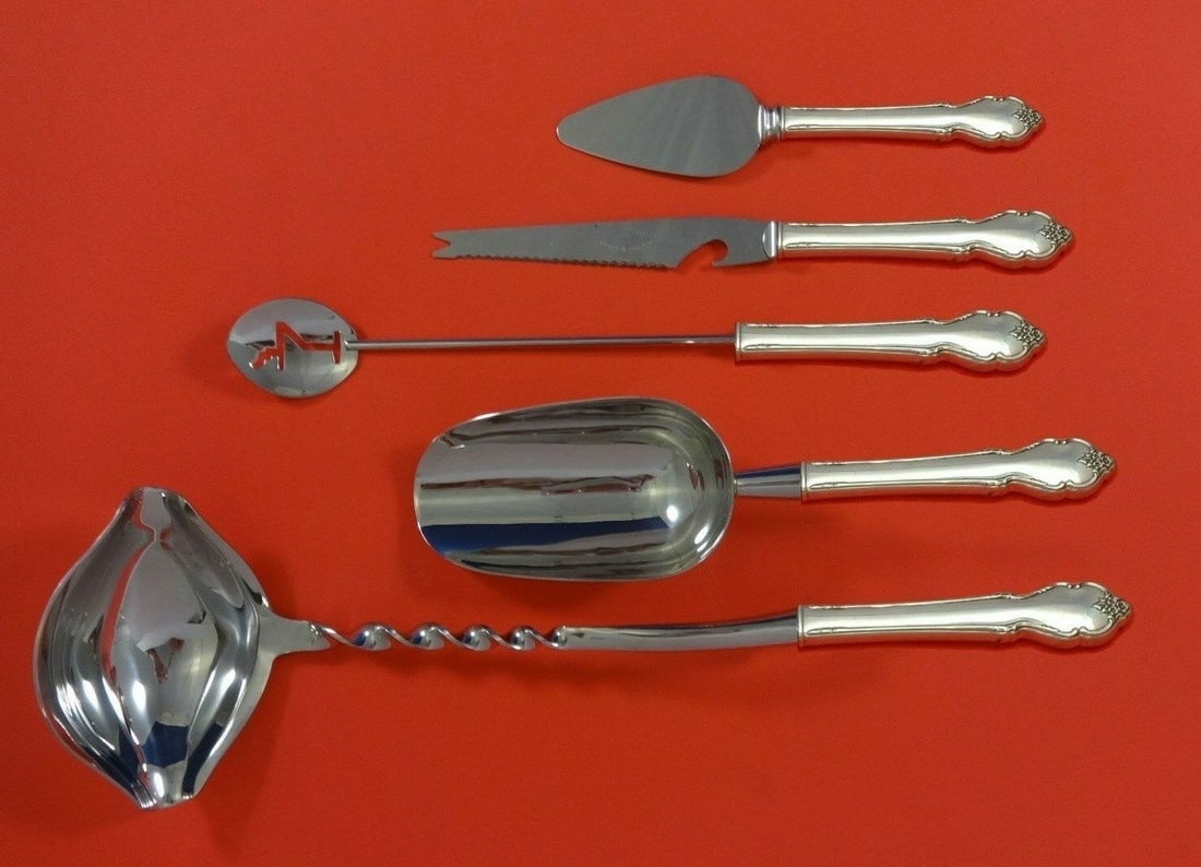 International Sterling Silver Breton Rose 5pc Cocktail Bar Set: International Sterling Silver Breton Rose 5pc Cocktail Bar Set Elevate your cocktail gatherings with the exquisite Breton Rose Cocktail Party Bar Set from International Sterling. This post-1940 hostes