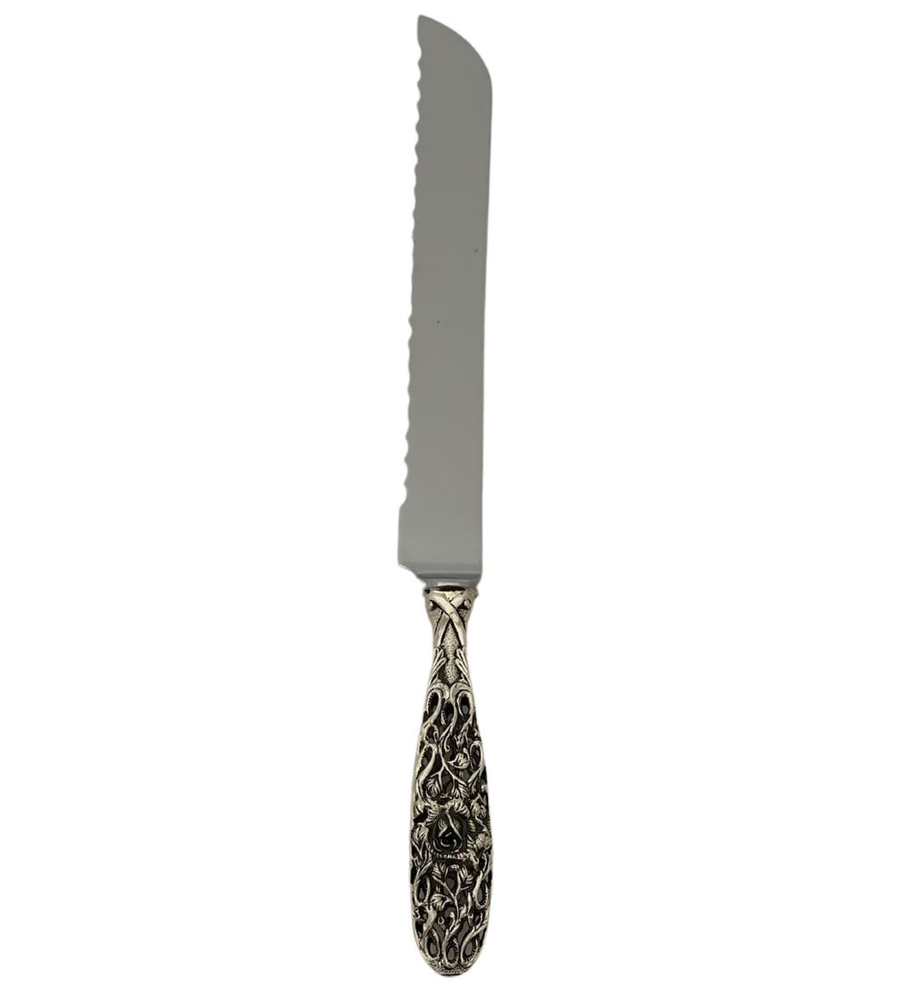 Italian 925 Sterling Silver Floral Ornate Serrated Bread Knife 11.50": Italian 925 Sterling Silver Floral Ornate Serrated Bread Knife 11.50" This exquisite Italian 925 sterling silver bread knife combines functionality with elegant design. Handcrafted with ornate floral 