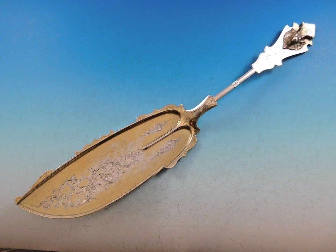 Duhme Saxon Stag Coin Silver Fish Server 12.5 in Gold Washed: Duhme Saxon Stag Coin Silver Fish Server 12.5 in Gold Washed Presenting the Saxon Stag Fish Server by Duhme, a stunning piece crafted from coin silver. This exceptional serving piece measures 12 1/2" 