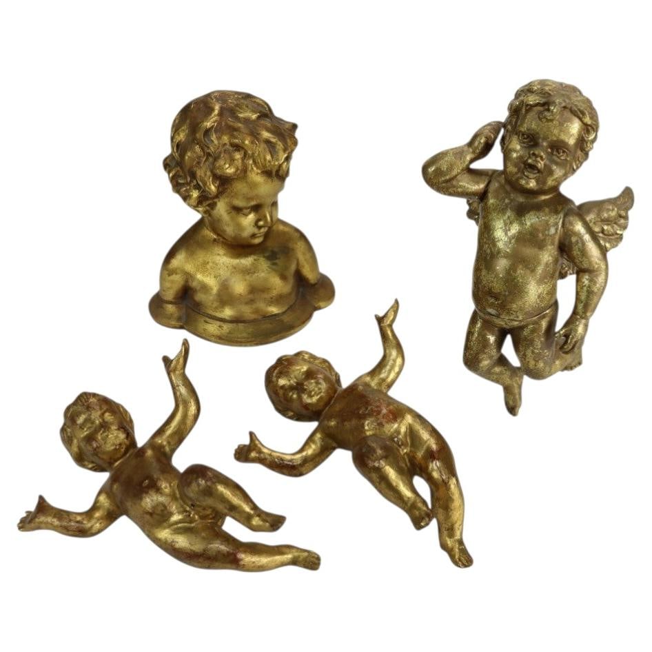 Set of 4 Italian giltwood cherub sculptures Niccolini c1950: Set of 4 Italian giltwood cherub sculptures Niccolini c1950 This set includes four vintage Italian giltwood cherub sculptural elements attributed to Niccolini, crafted around 1950. The collection feat